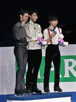 Hanyu (center) with Jason Brown (left) and Yuma Kagiyama (right) at the victory ceremony of the 2020 Four Continents Championships