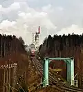 A freight train departing from a pulp mill in Äänekoski.