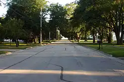 A tree lined street in Albert City