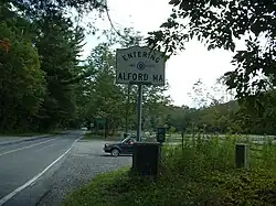 The state line at Route 71, with a Knox Trail marker beside the road sign.