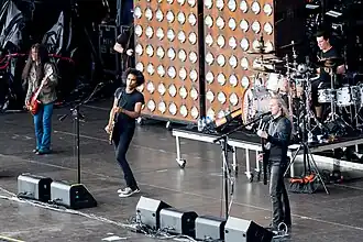 The band performing onstage