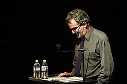 Aram Saroyan speaking at Beyond Baroque Literary Arts Center, Los Angeles.