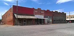 A row of buildings south of the Stonewall County Courthouse in Aspermont, Texas.