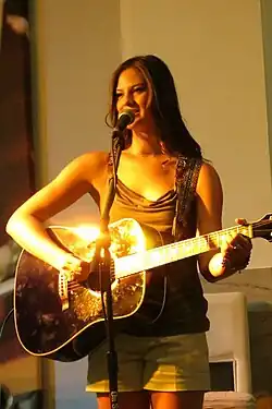 Brown playing the guitar