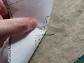 کوک زدن به منظور نشاندن الگو روی پارچه قبل از برش پارچه