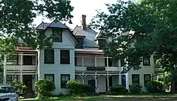 The 1881–82 Stick style annex for the Bon Air Hotel, which survived the fire that destroyed the main hotel in 1889.