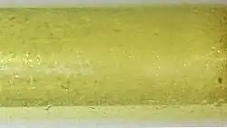 A glass container filled with chlorine gas
