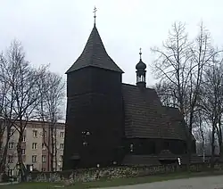 St. Lawrence's Church (16th century). Originally in Knurów, in 1935 the wooden church was moved to خوژوف