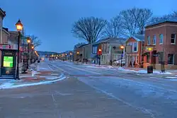 Dawn in Downtown Le Claire by Burt Gearhart