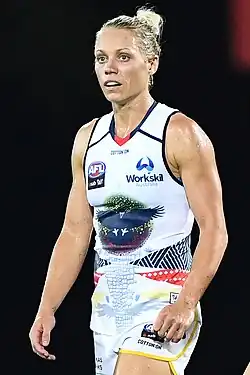 Close-up photo of Phillips in an Adelaide away guernsey