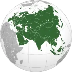 Globe centered on Asia, with Asia highlighted. The continent is shaped like a right-angle triangle, with Europe to the west, oceans to the south and east, and Australia visible to the south-east.