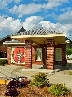 The old Heard County gas station was built in 1938 and features a vintage, hand-painted کوکاکولا advertisement.