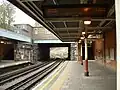 Looking north ('eastbound' due to loop line from Hainault), at northern end of station