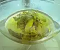 سپس، بوتیلن اکساید و تکهٔ کوچکی از ید به آن اضافه می‌شود.