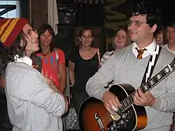 Harry and the Potters performing in June 2010. From left to right: Joe, and Paul DeGeorge