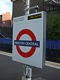 Roundel on southbound platform face, advising passengers for the R.A.F. Museum to alight at Colindale, one stop to the north