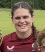 Headshot od Ilona Maher in her sports jersey