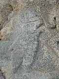 نجیب‌زاده ارمنی در حال هدیه دادن به اردشیر بابکان (همچنین احتمال دارد که این نجیب زاده، ساتراپ ارمنستان باشد که حلقه شاهی را از اردشیر دریافت می‌کند.)
