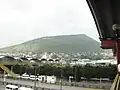 View of (extinct) volcano "La Caldera" taken from the  Metro La Paz  station of the متروی مکزیکو سیتی in the city/municipality of Los Reyes Acaquilpan