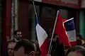 پرچم فرانسه و ترکیه در راهپیمایی در پاریس در ژانویه ۲۰۱۵