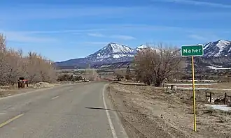 Maher in 2016, with Mount Lamborn in the distance.