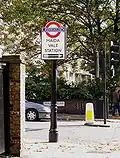 Sign on the main road for the station