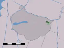 The town centre (dark green) and the statistical district (light green) of Neck in the municipality of Wormerland.