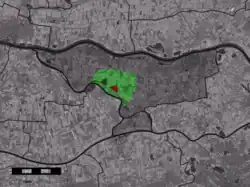 The village centre (red) and the statistical district (light green) of Aalst in the municipality of Zaltbommel.