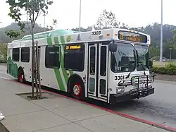 A Marin Transit New Flyer 35-foot low floor hybrid bus operating as a Route 19 to Tiburon at Marin City. This bus operates using hybrid-electric technology, allowing it to save fuel costs by using electric power when used in city streets.