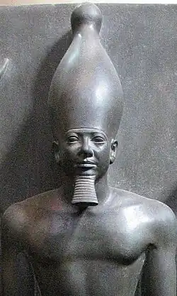 مجسمهٔ منکورع از جنس ماسه‌سنگ رسوبی گری‌وکموزه مصر،  قاهره