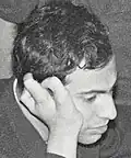 میخائیل تال شطرنج‌باز که دست راست او سه انگشت داشت.