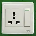 So-called "universal socket" which meets no standard but accepts a number of different plug نوعs.(criticized as unsafe)