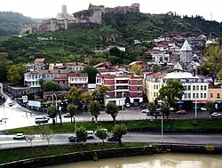 View of the church (middle right) و Narikala fortress