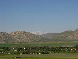Nuevo, California, Distant view of snow-capped San Gabriel Mountains from Nuevo road