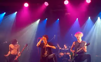 ONE OK ROCK performing in London, 2014.From left to right: Ryota, Taka, Tomoya, Toru.