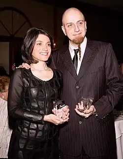 Odadjian accepting GenNext's "Community Hero Award"