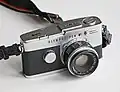 دوربین المپوسFT و لنز زویکو 38mm f1.8