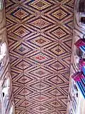 Painted nave ceiling.