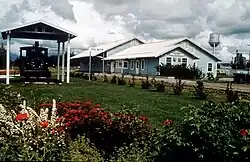 Palmer depot with a narrow gauge locomotive.