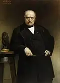 Portrait of Antoine-Louis Barye with a Wax Model of Seated Lion (1868) موزه هنری والترز