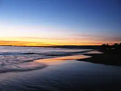 Sunset at Seacliff State Beach in Aptos, California.