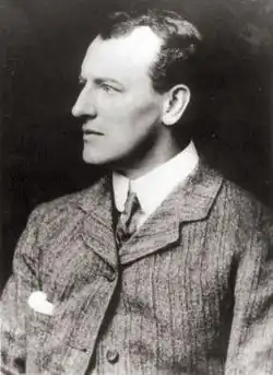 Photograph of Sidney Paget, dressed in a suit and looking to his right