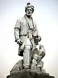 تندیسی از شاعر پرآوازه فارسی فردوسی، نصب شده در میدان فردوسی تهران در ۱۷ خرداد ۱۳۳۸