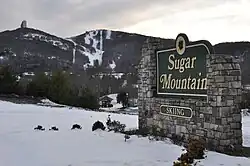 Sugar Mountain Sign and Mountain in Background