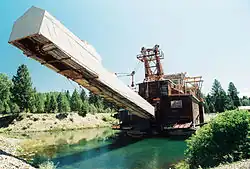 The historic dredge at Sumpter Valley Dredge State Heritage Area recalls Sumpter's استخراج طلا origins.