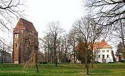 Szamotuły Castle seen from a park