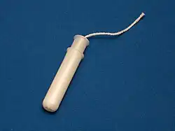 Tampon in plastic applicator