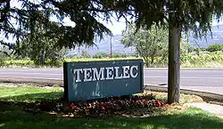 The north entrance sign for the Temelec housing development, at the corner of Almeria and Arnold