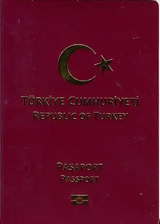 cover of Turkish passport (maroon with gold letters)