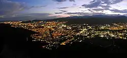 View of San Blas and Parroquia Urbana Socorro, central Valencia in night, from El Calvario area